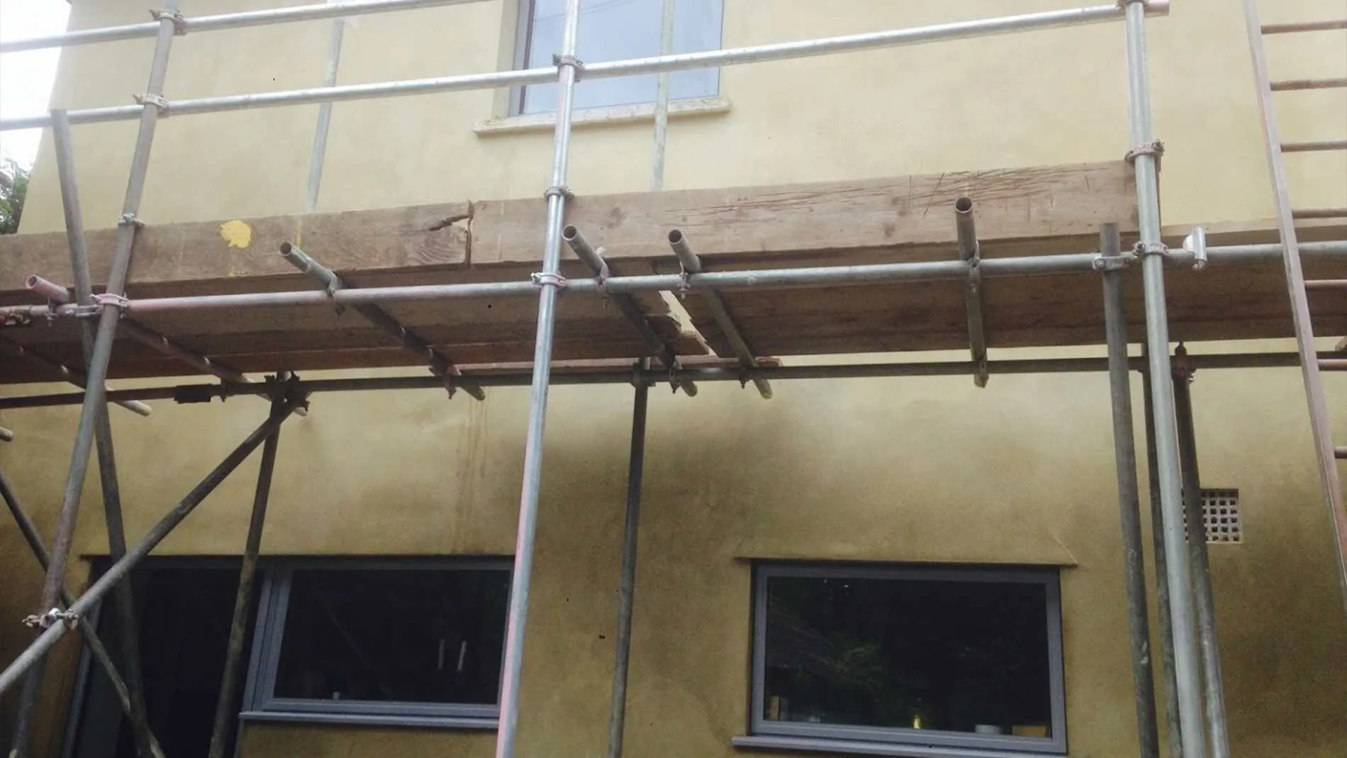 Rendered gable wall viewed from the scaffold, Surrey